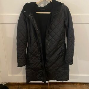 Uniqlo long black jacket with fleece lining